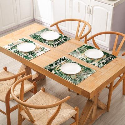 palm tree placemats on wooden table