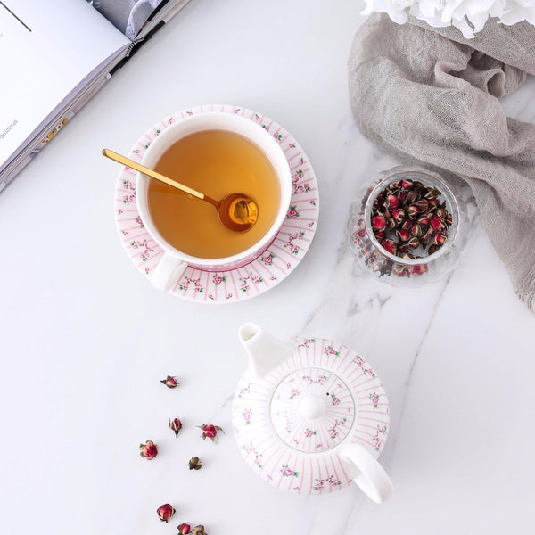 pink and white floral tea pot set